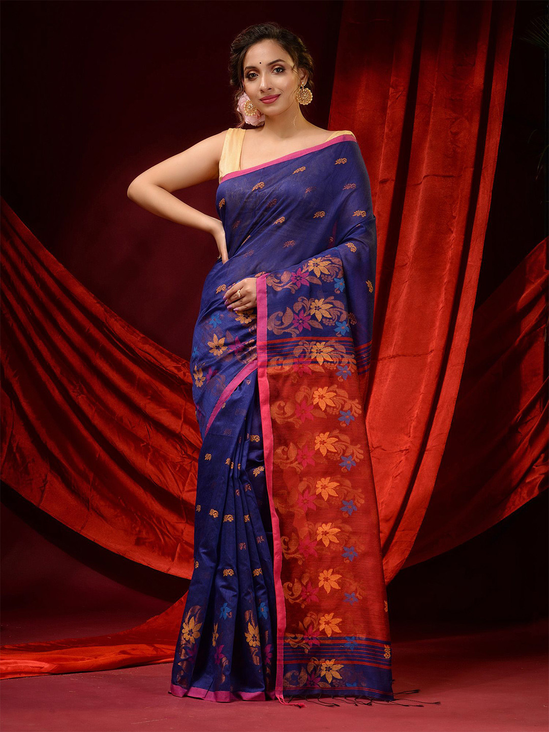 

Charukriti Blue & Red Floral Woven Design Zari Saree