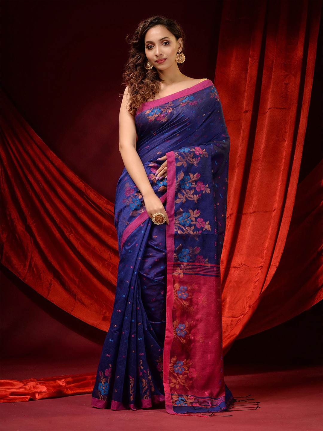 

Charukriti Blue & Gold-Toned Floral Woven Design Zari Saree