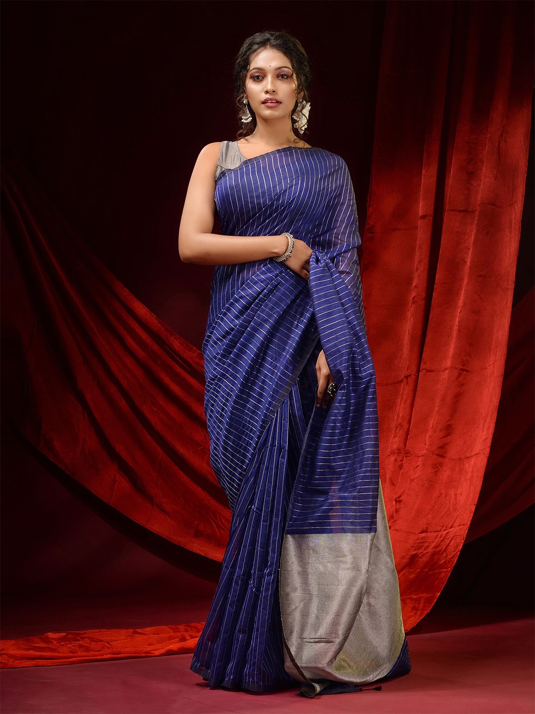 

Charukriti Blue & Gold-Toned Striped Silk Cotton Saree