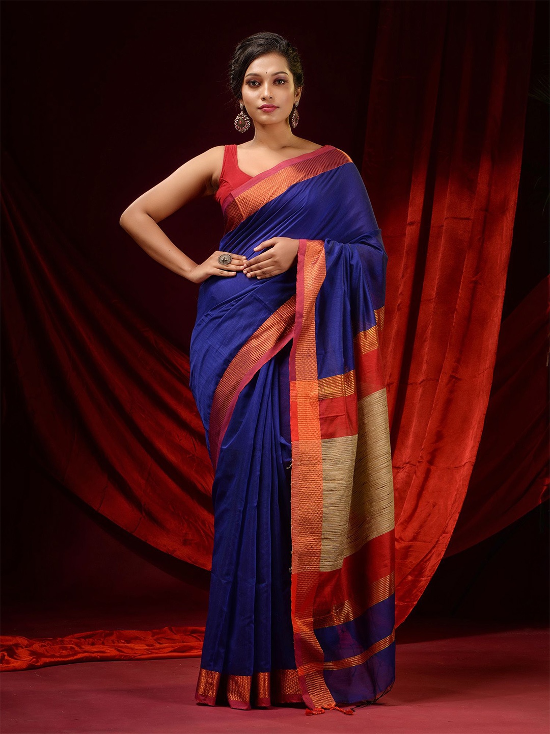 

Charukriti Blue & Red Woven Design Zari Silk Cotton Saree