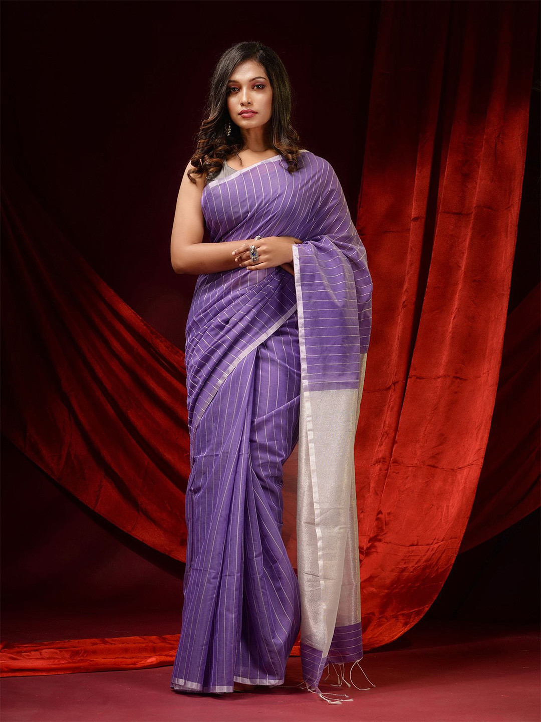 

Charukriti Purple & Silver-Toned Striped Silk Cotton Saree