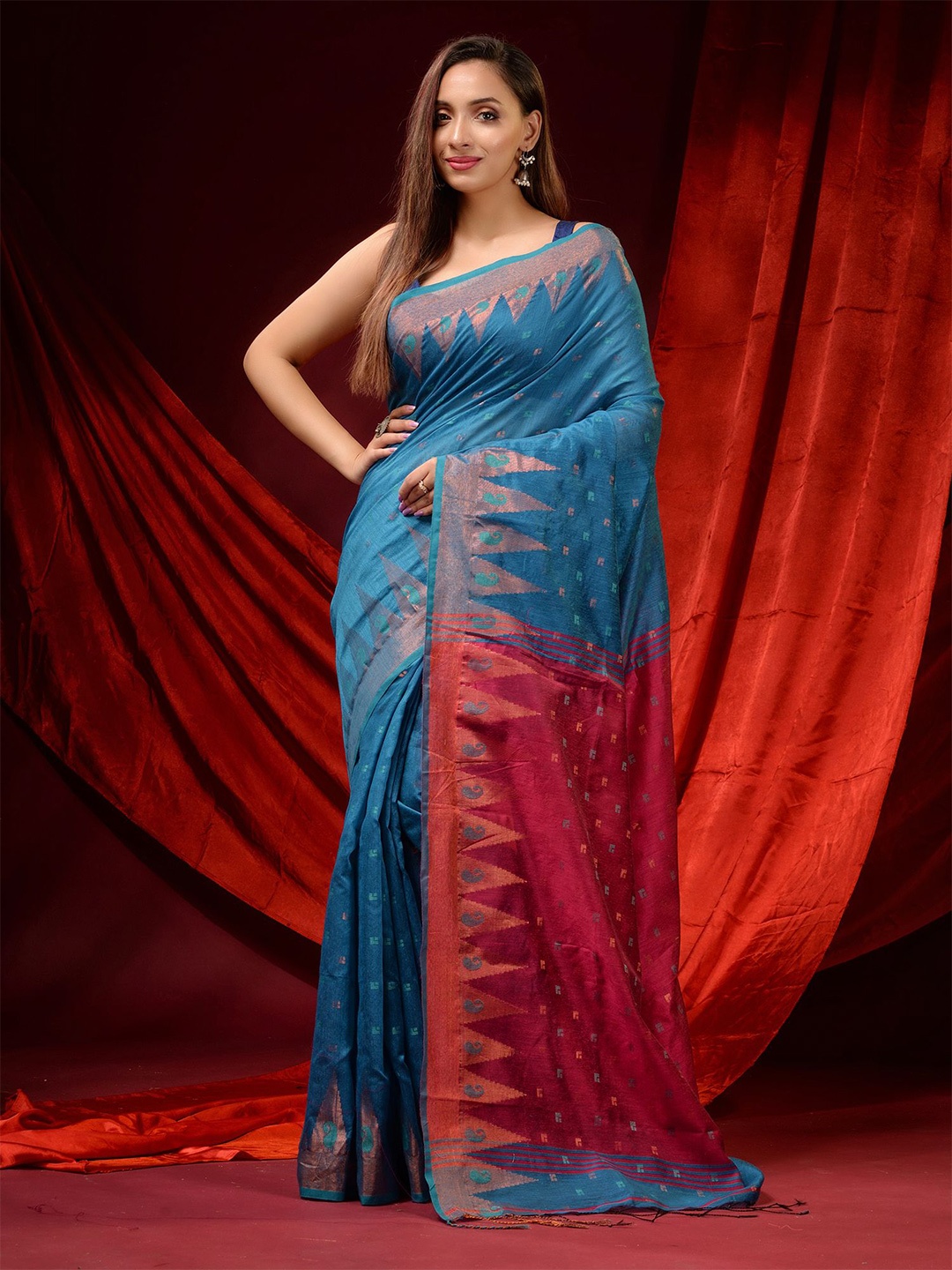 

Charukriti Blue & Pink Woven Design Saree