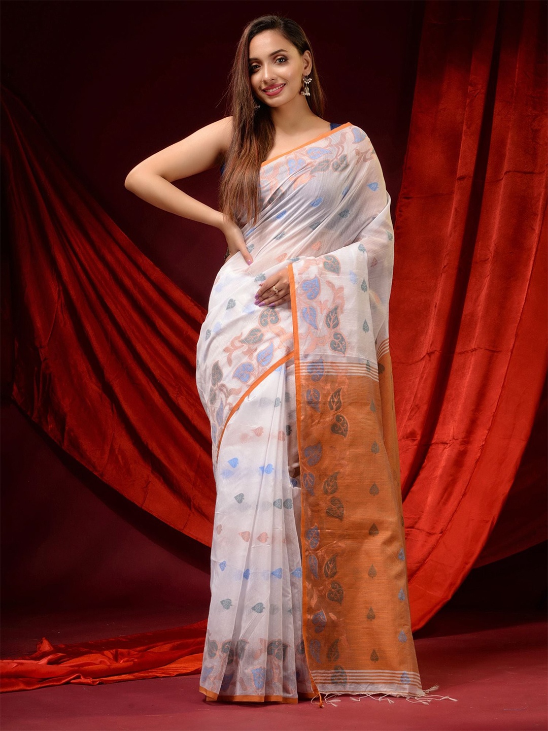 

Charukriti White & Blue Floral Zari Pure Cotton Saree