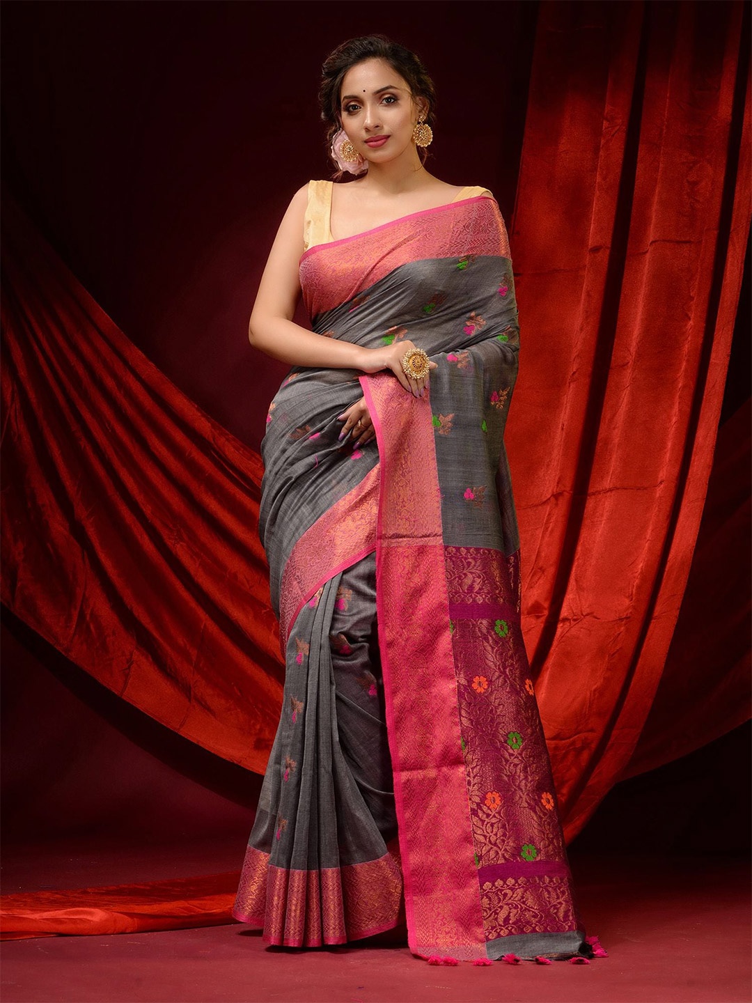 

Charukriti Blue Floral Pure Cotton Saree
