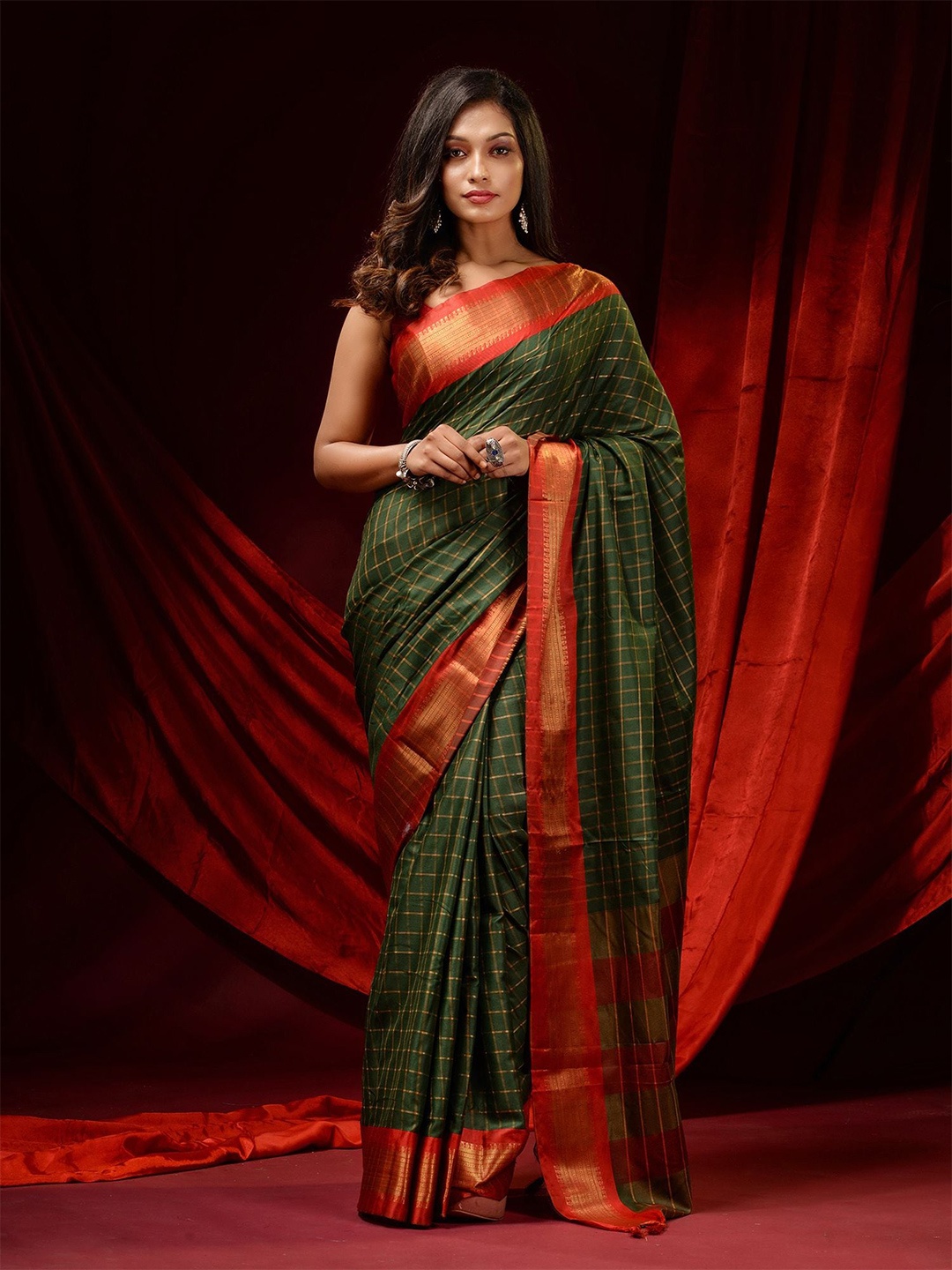 

Charukriti Green & Red Checked Zari Silk Cotton Saree