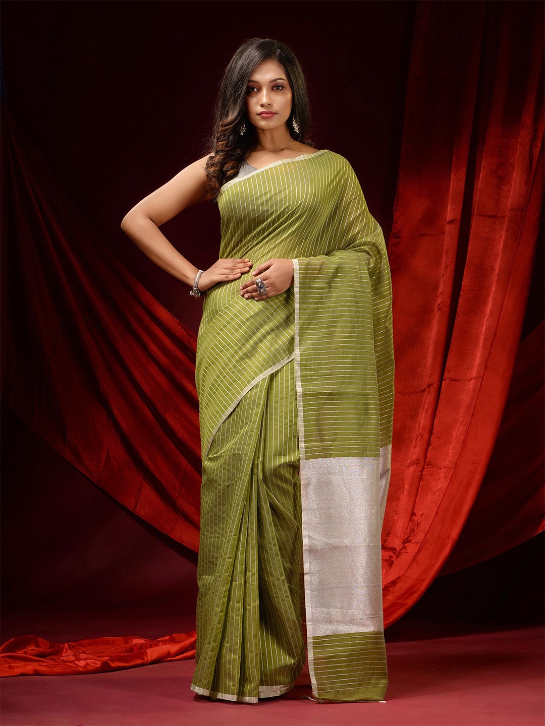 

Charukriti Green & Gold-Toned Striped Silk Cotton Saree