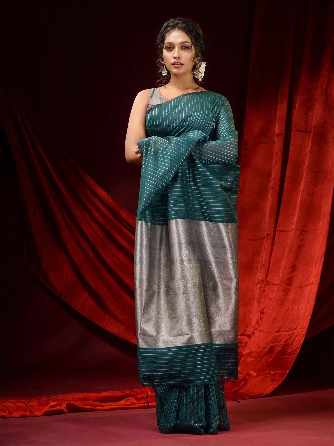 

Charukriti Teal & Silver-Toned Striped Zari Silk Cotton Saree
