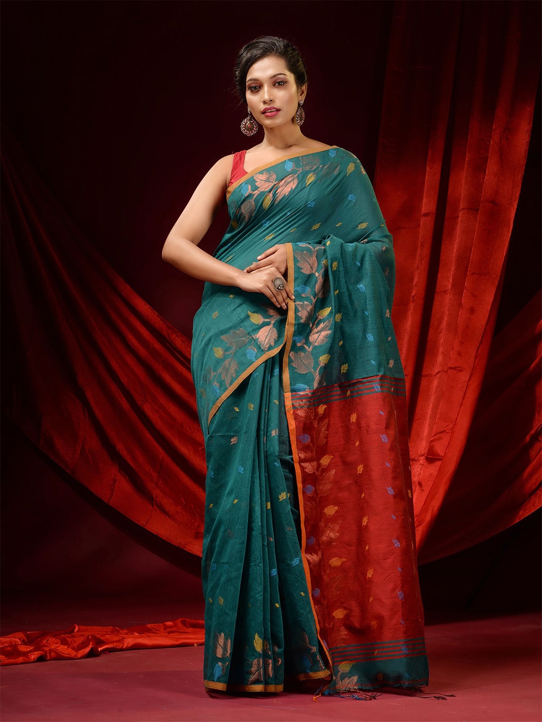 

Charukriti Teal & Gold-Toned Woven Design Zari Saree