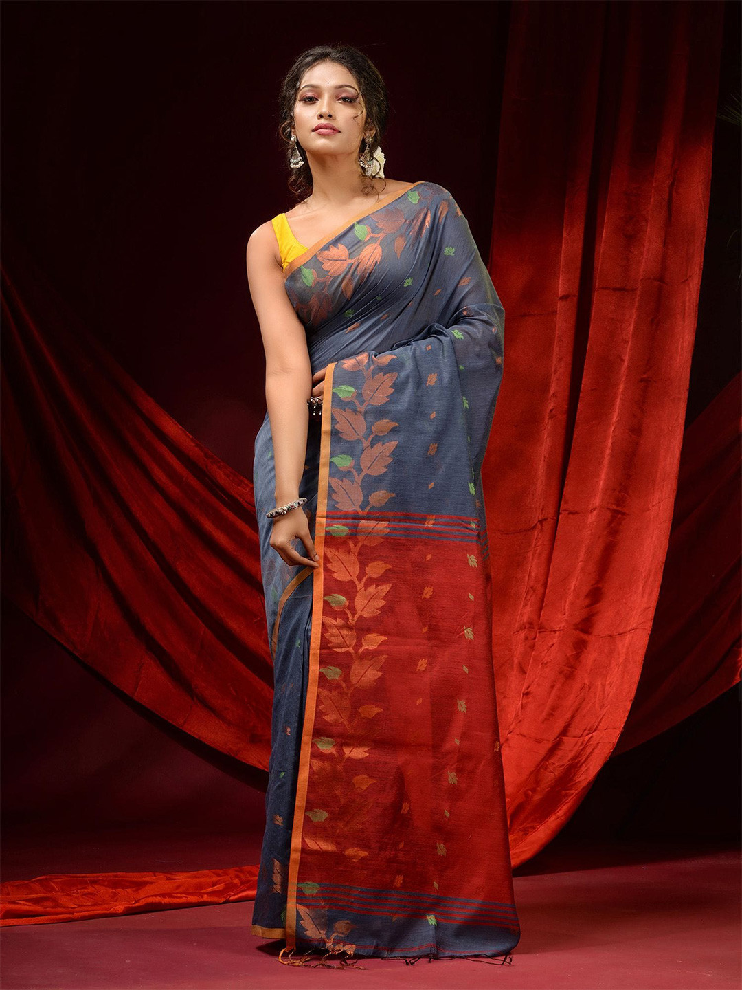 

Charukriti Navy Blue & Red Woven Design Zari Saree