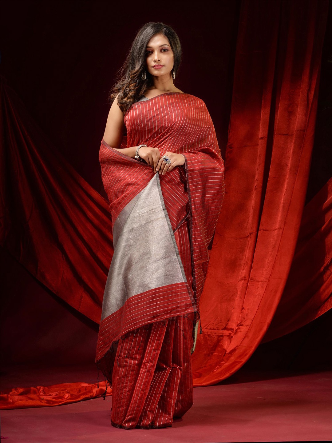

Charukriti Maroon & Silver-Toned Striped Zari Silk Cotton Saree