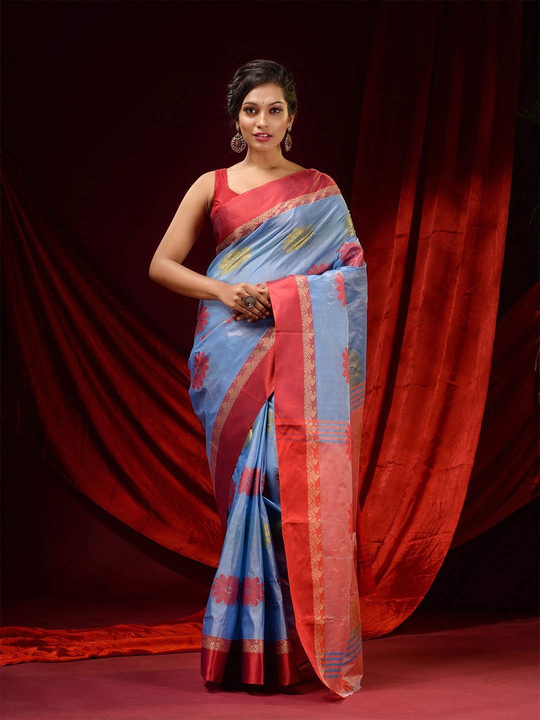 

Charukriti Blue & Red Floral Zari Pure Silk Tussar Saree