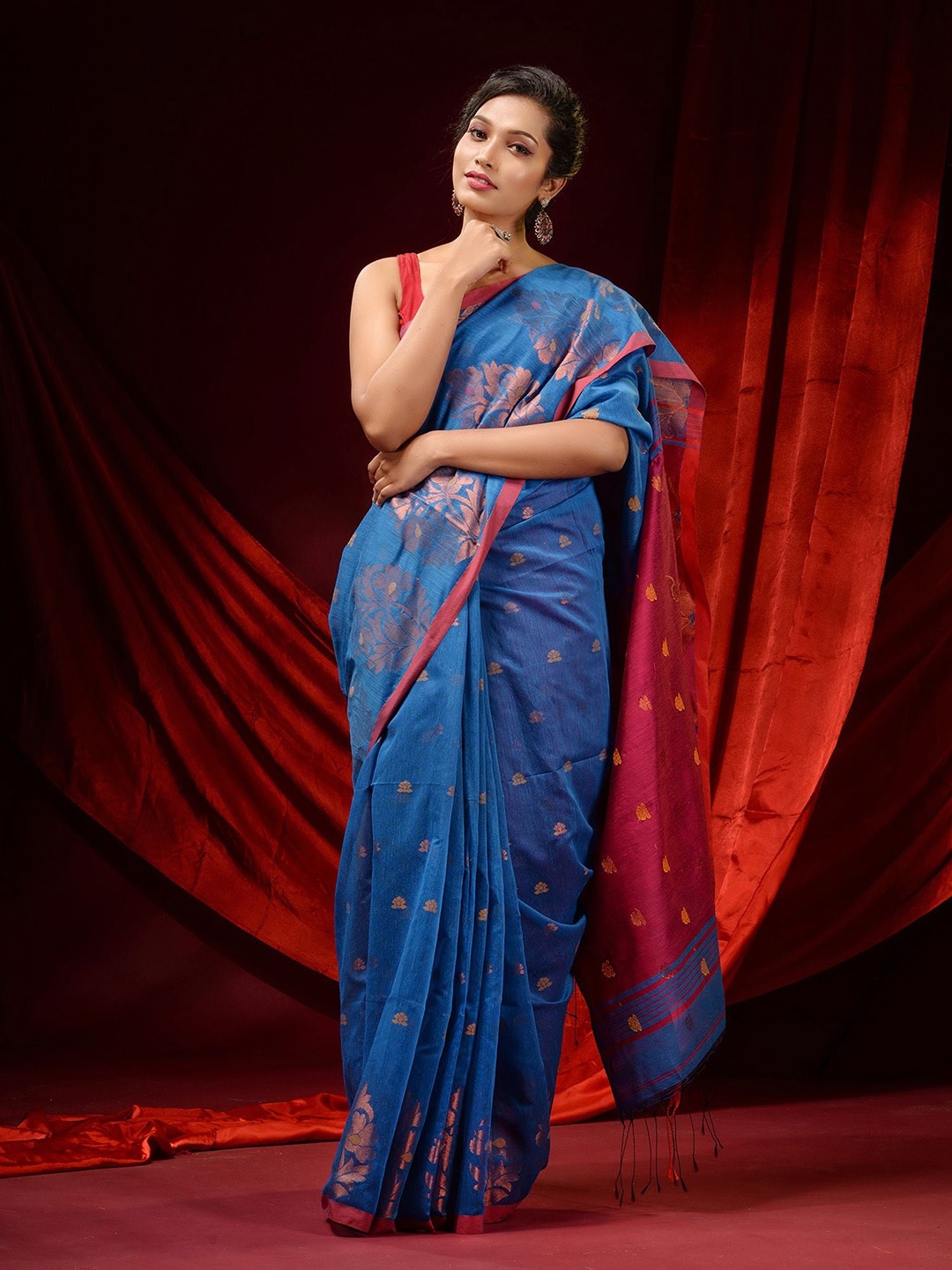 

Charukriti Blue & Red Woven Design Zari Saree