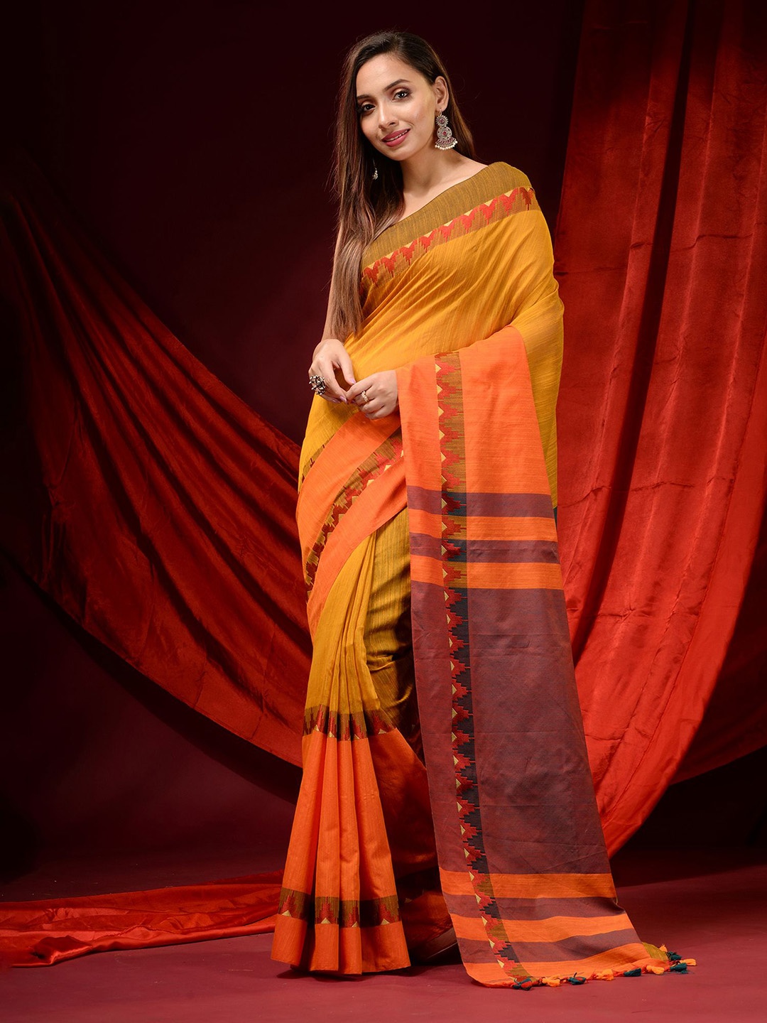 

Charukriti Yellow & Orange Pure Cotton Saree