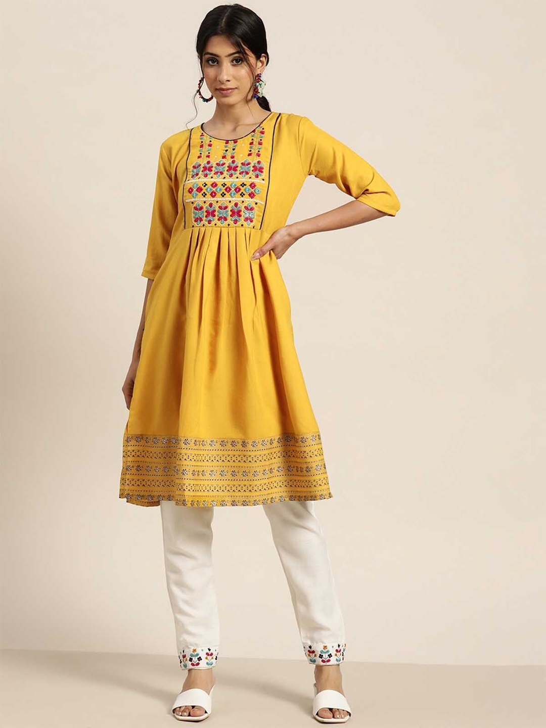 

ODETTE Women Mustard Yellow Floral Embroidered Thread Work Kurta with Trousers