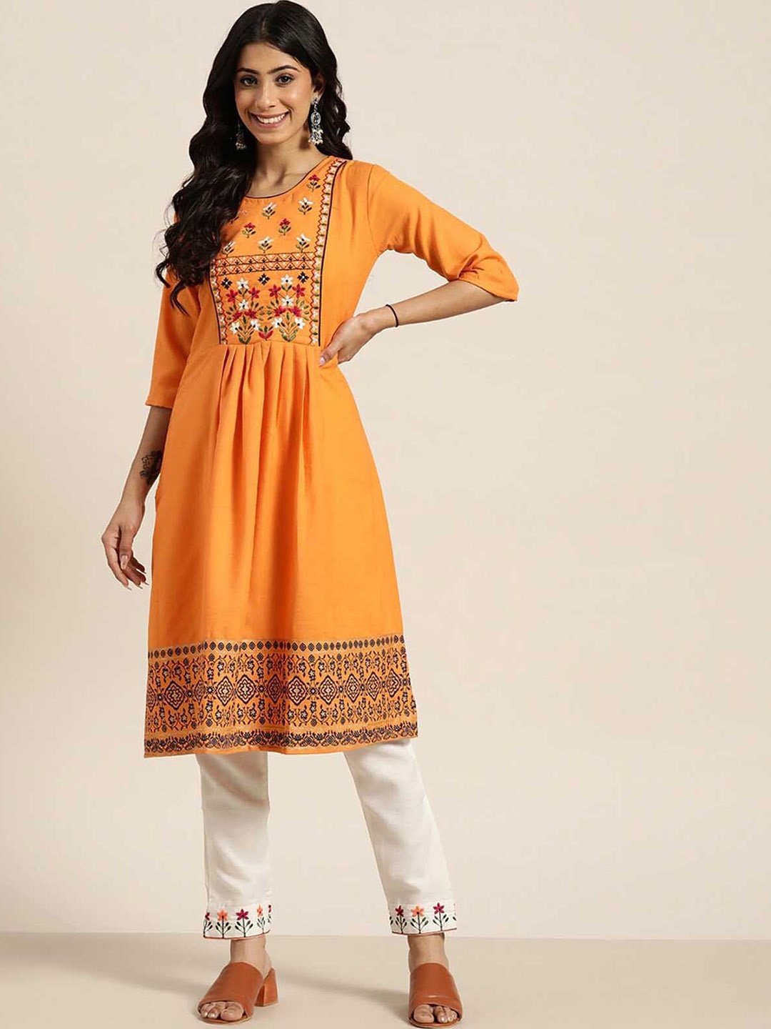 

ODETTE Women Orange Embroidered Pleated Thread Work Kurta with Trousers