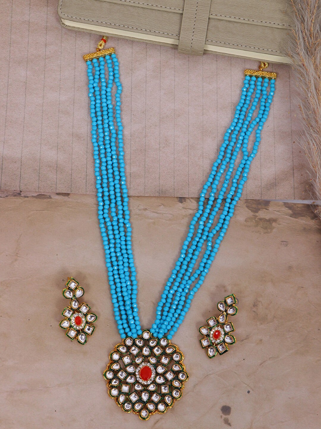 

Crunchy Fashion Gold-Plated Blue & White Kundan & Beaded Jewellery Set