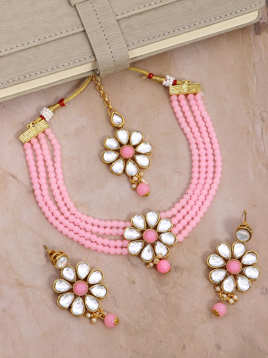 

Crunchy Fashion Gold-Plated Pink Studded & Pearl Beaded Jewellery Set