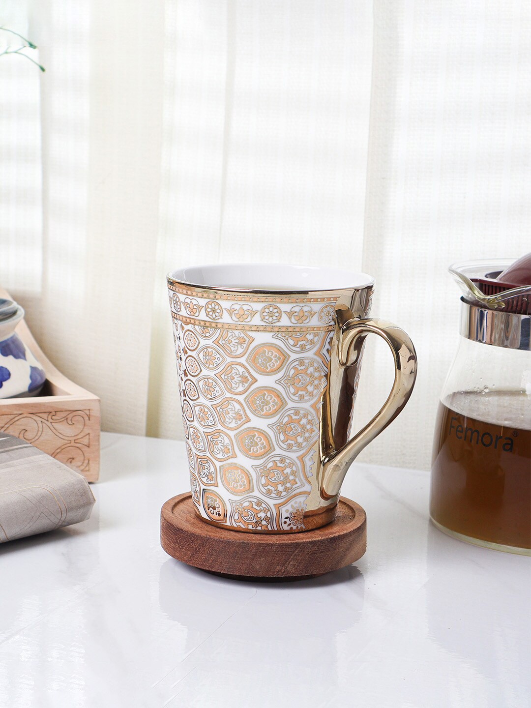 

Femora Indian Gold-Toned & White Floral Printed Bone China Glossy Mug 330 ML