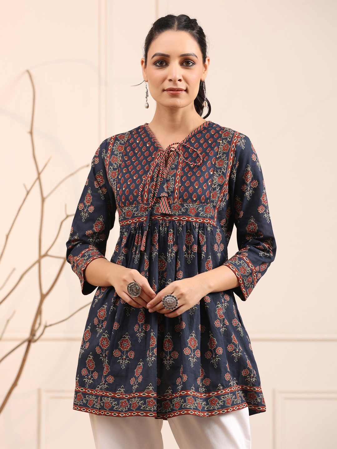 

Rain & Rainbow Blue & Rust Floral Printed Pure Cotton Empire Kurti