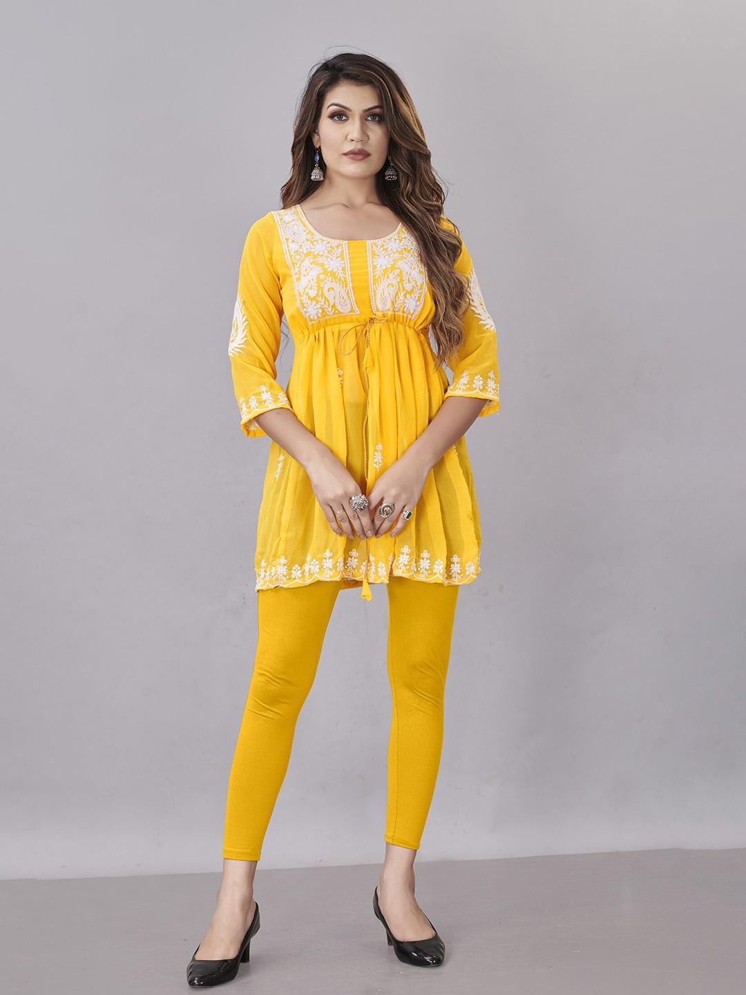 

Fashion FRICKS Yellow Ethnic Motifs Embroidered Chikankari Pleated Kurti