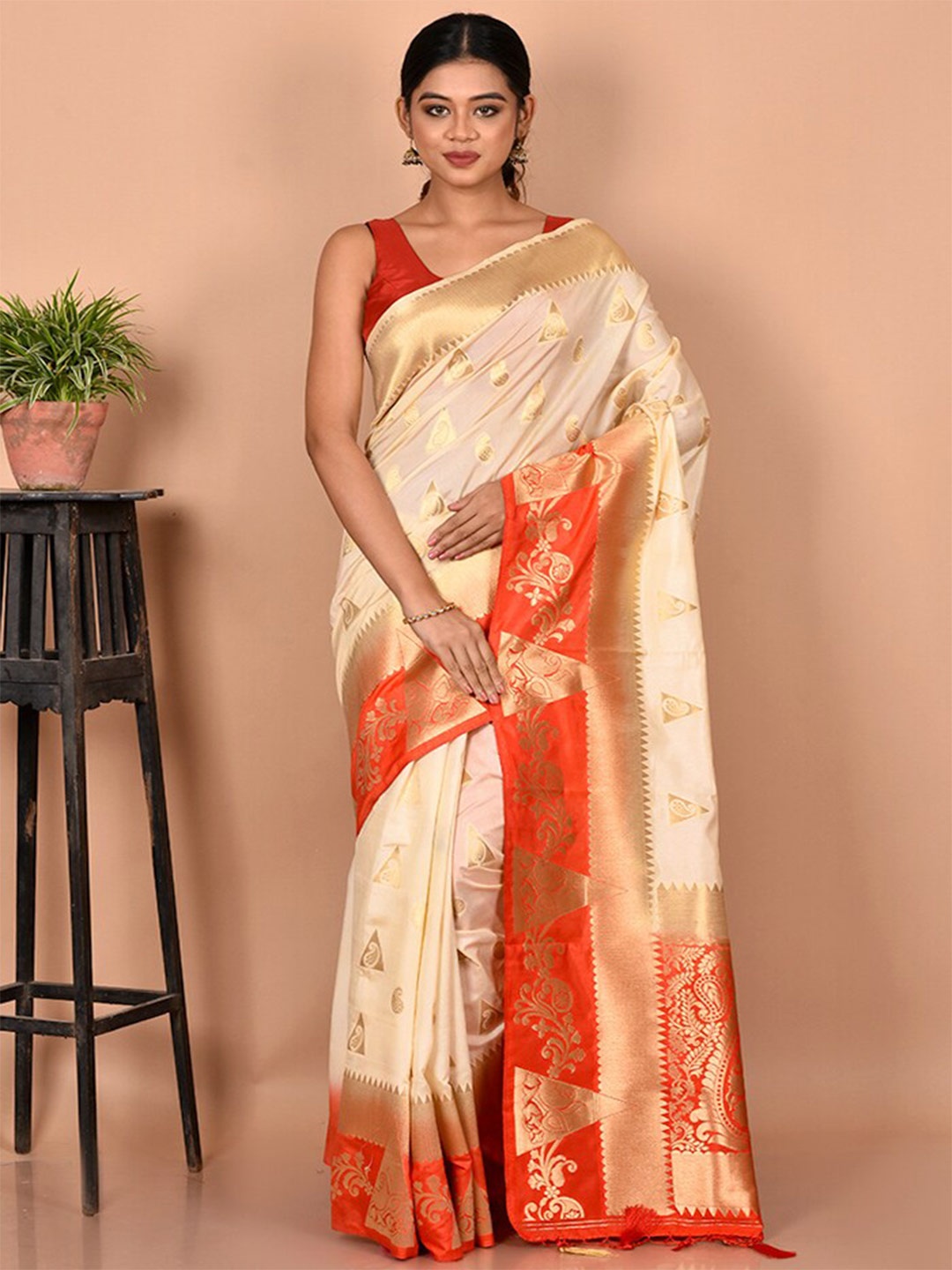 

AllSilks Cream-Coloured & Orange Ethnic Motifs Zari Silk Blend Saree