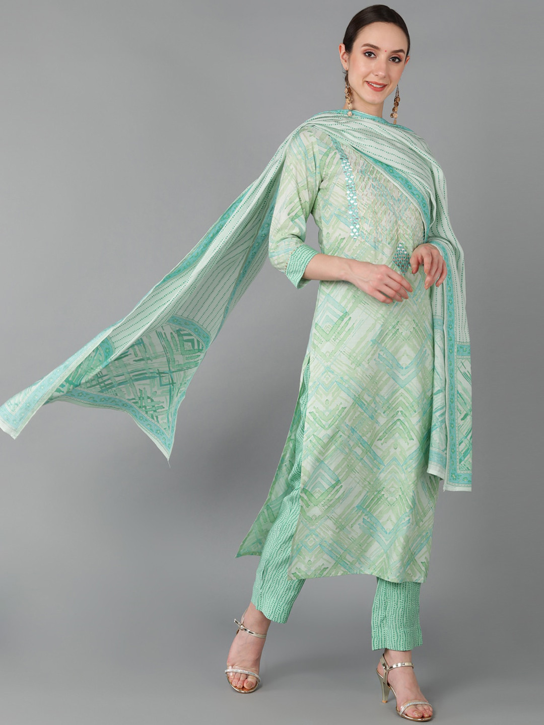 

AHIKA Women Sea Green Ethnic Motifs Yoke Design Mirror Work Kurta with Trousers & Dupatta