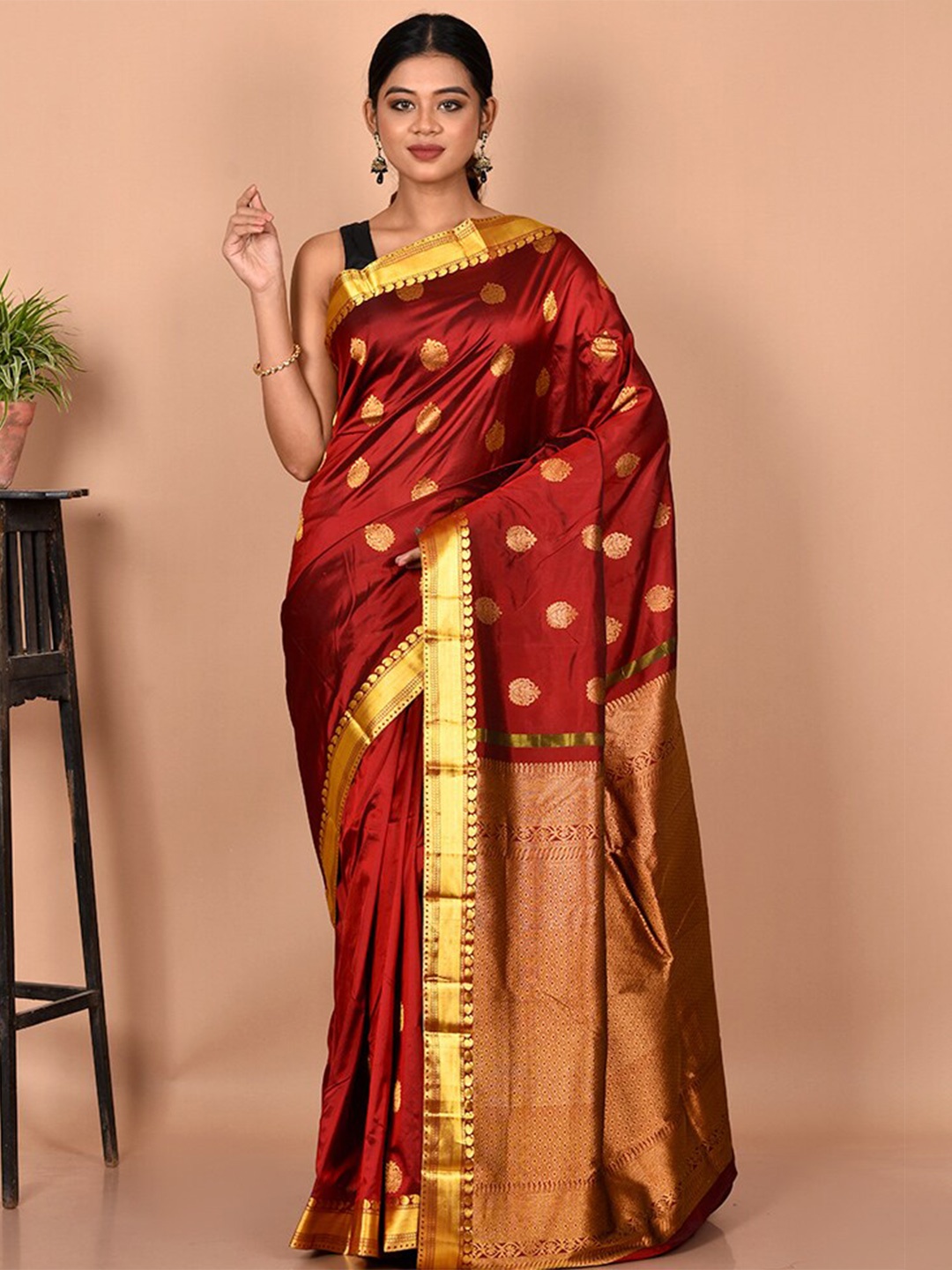 

AllSilks Maroon & Gold-Toned Ethnic Motifs Zari Pure Silk Kanjeevaram Saree