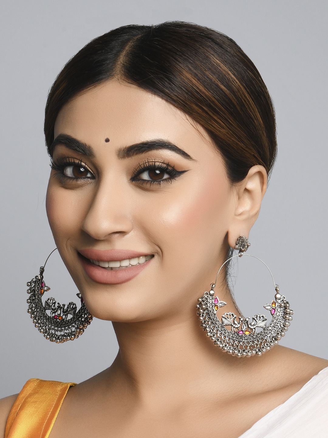 

Fida Orange Silver Plated Peacock Shaped Chandbalis Earrings