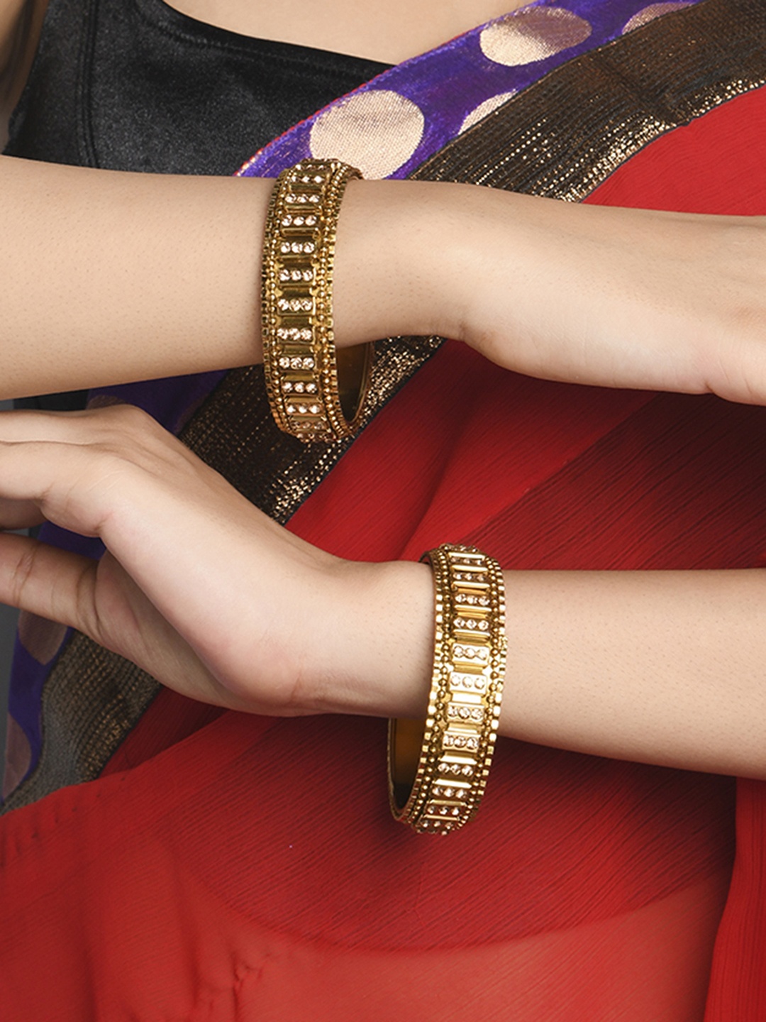 

Fida Set Of 2 Gold-Plated Yellow Stones Studded Antique Bangles