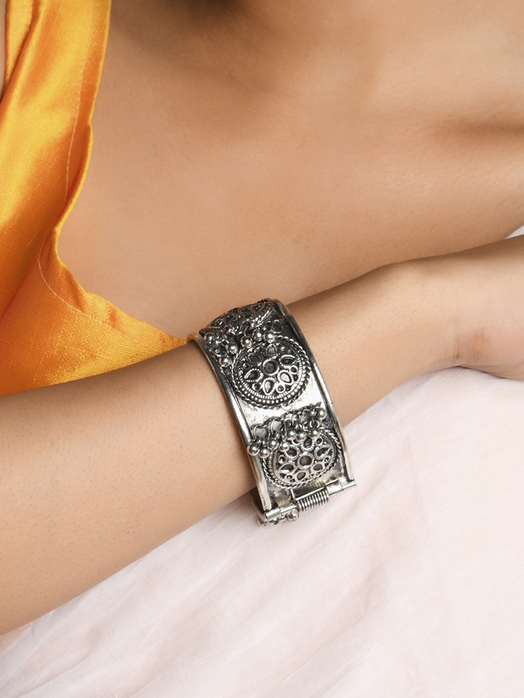 

Fida Women Silver-Toned Oxidised Silver-Plated Bangle-Style Bracelet