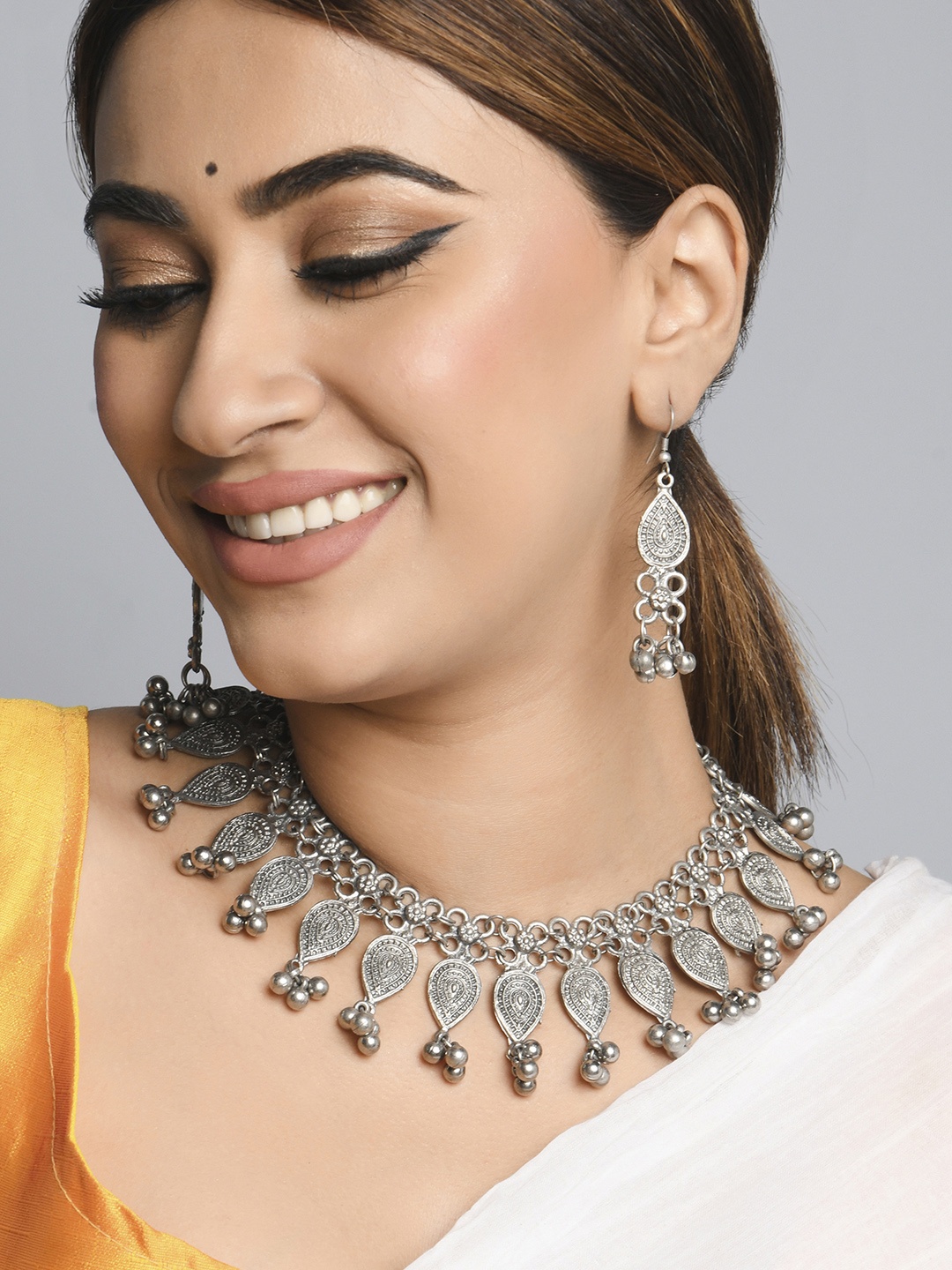 

Fida Ethnic Traditional Oxidised Silver-Plated Teardrop Charm Jewellery Set