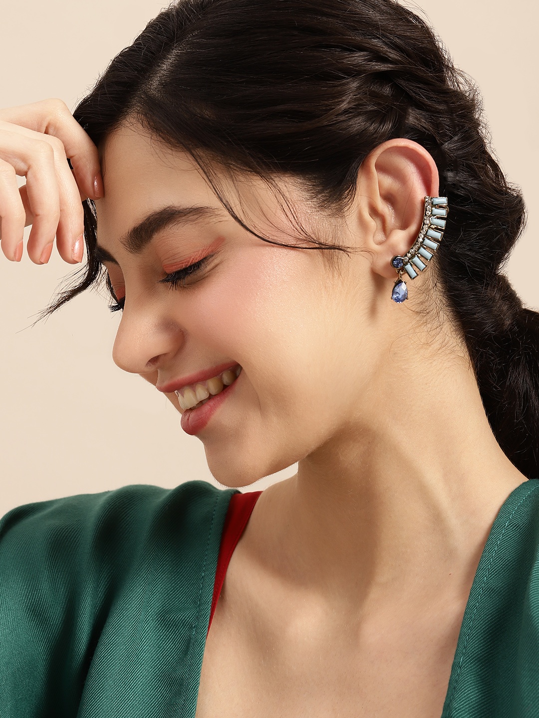 

Sangria Blue Embellished Contemporary Studs Earrings
