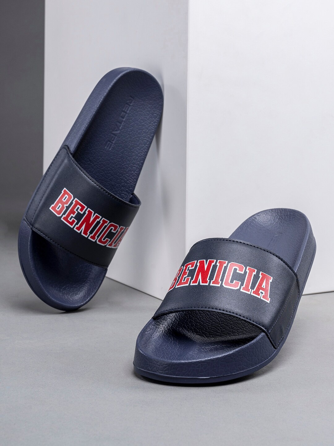 

Red Tape Men Navy Blue & Red Printed Sliders