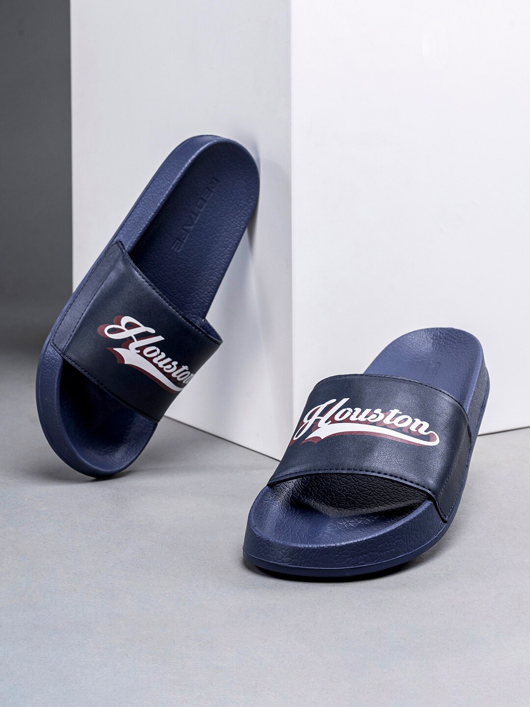 

Red Tape Men Navy Blue & White Printed Sliders