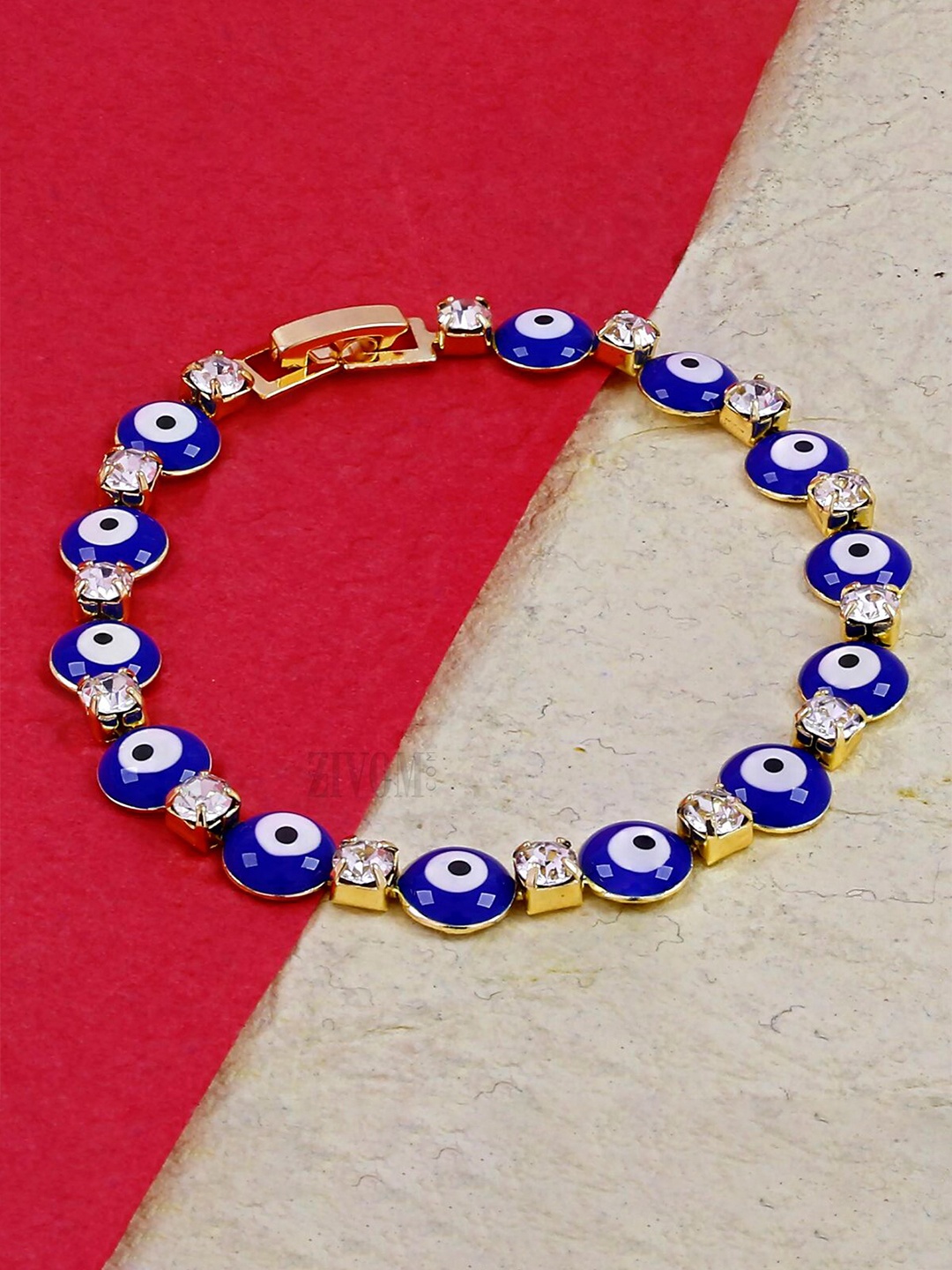 

ZIVOM Women Gold-Toned & Blue Brass Cubic Zirconia Antique Gold-Plated Charm Bracelet