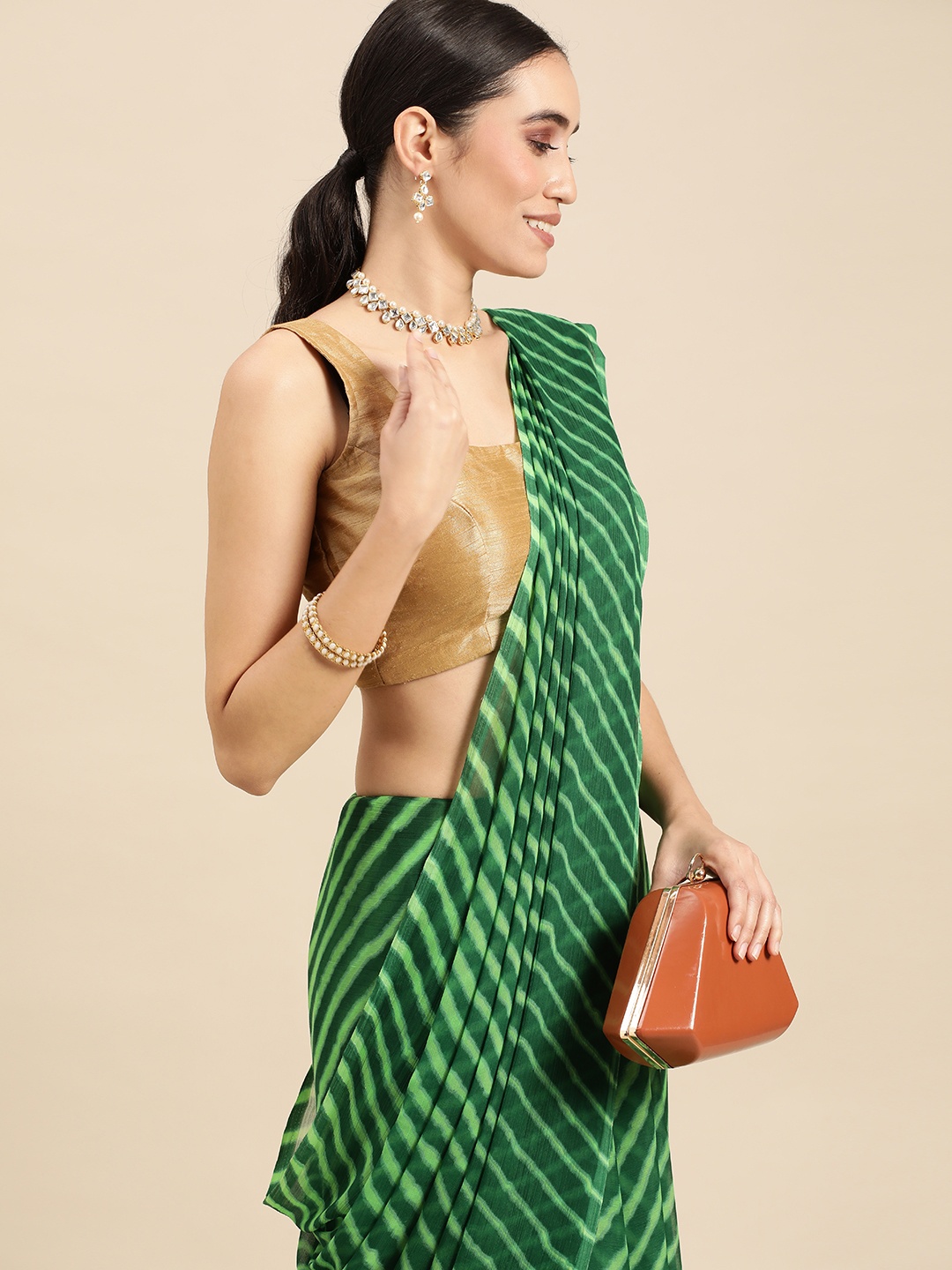 

Rani Saahiba Green Leheriya Saree