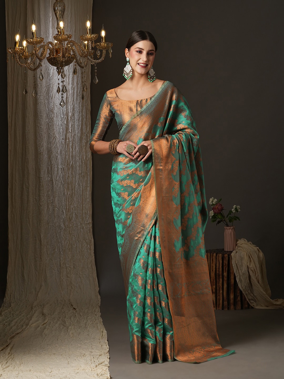 

Saree mall Teal & Gold-Toned Ethnic Motifs Zari Banarasi Saree