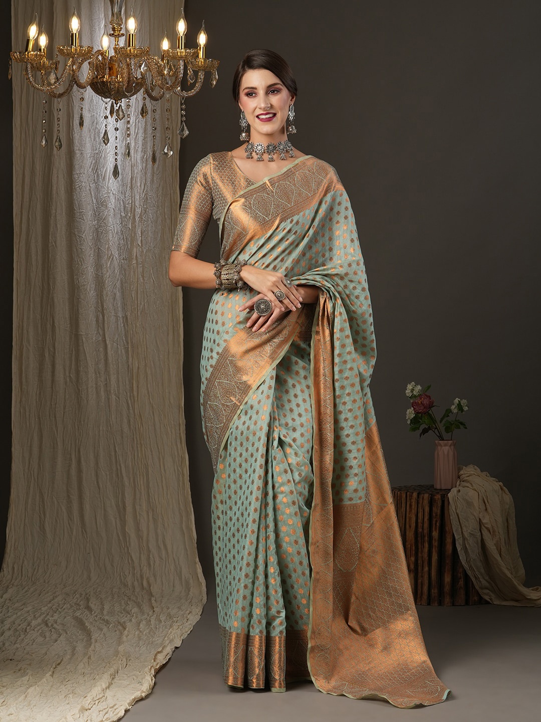 

Saree mall Sea Green & Copper-Toned Ethnic Motifs Zari Banarasi Saree