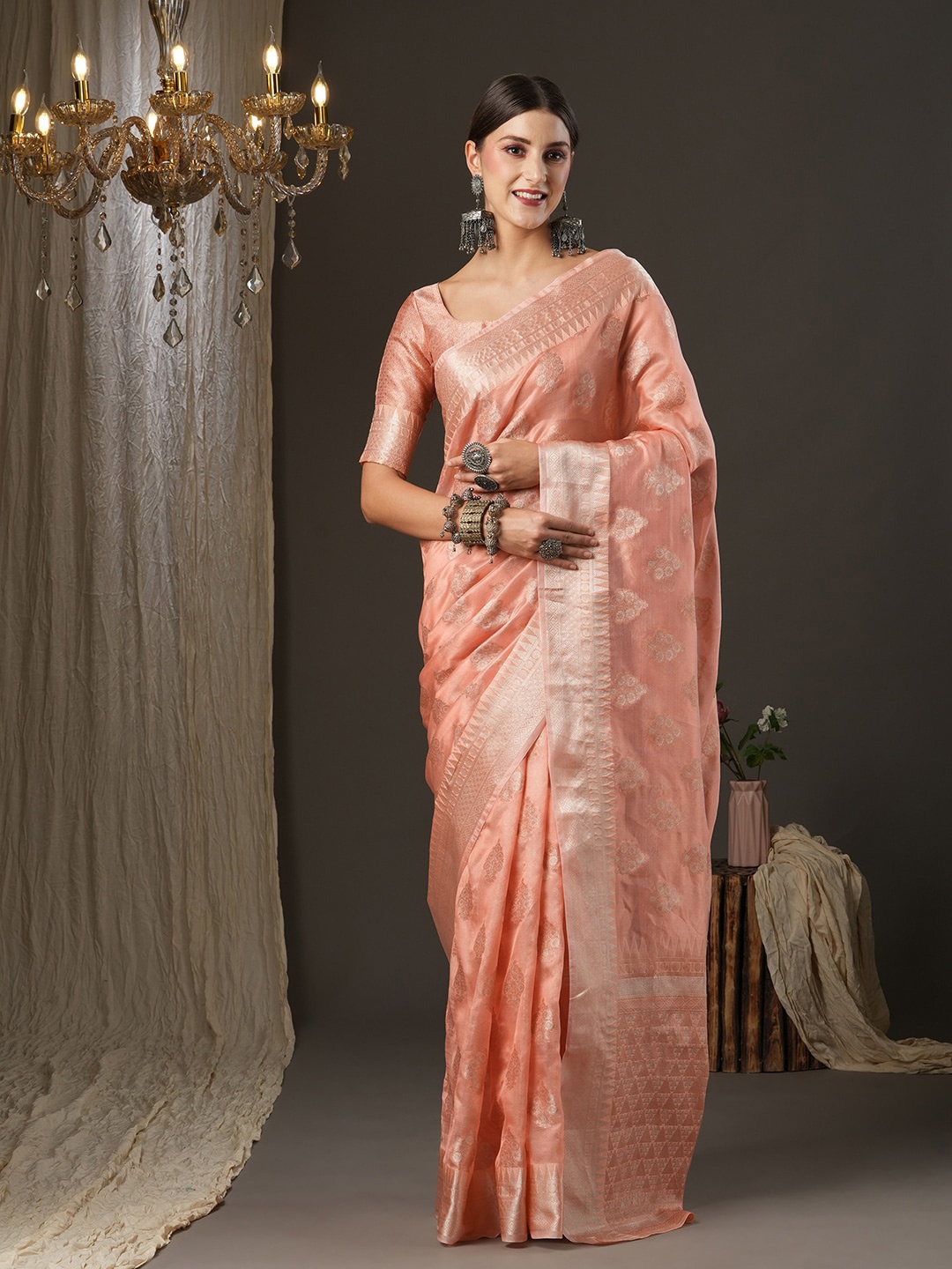 

Saree mall Peach-Coloured & Gold-Toned Ethnic Motifs Zari Organza Dabu Saree