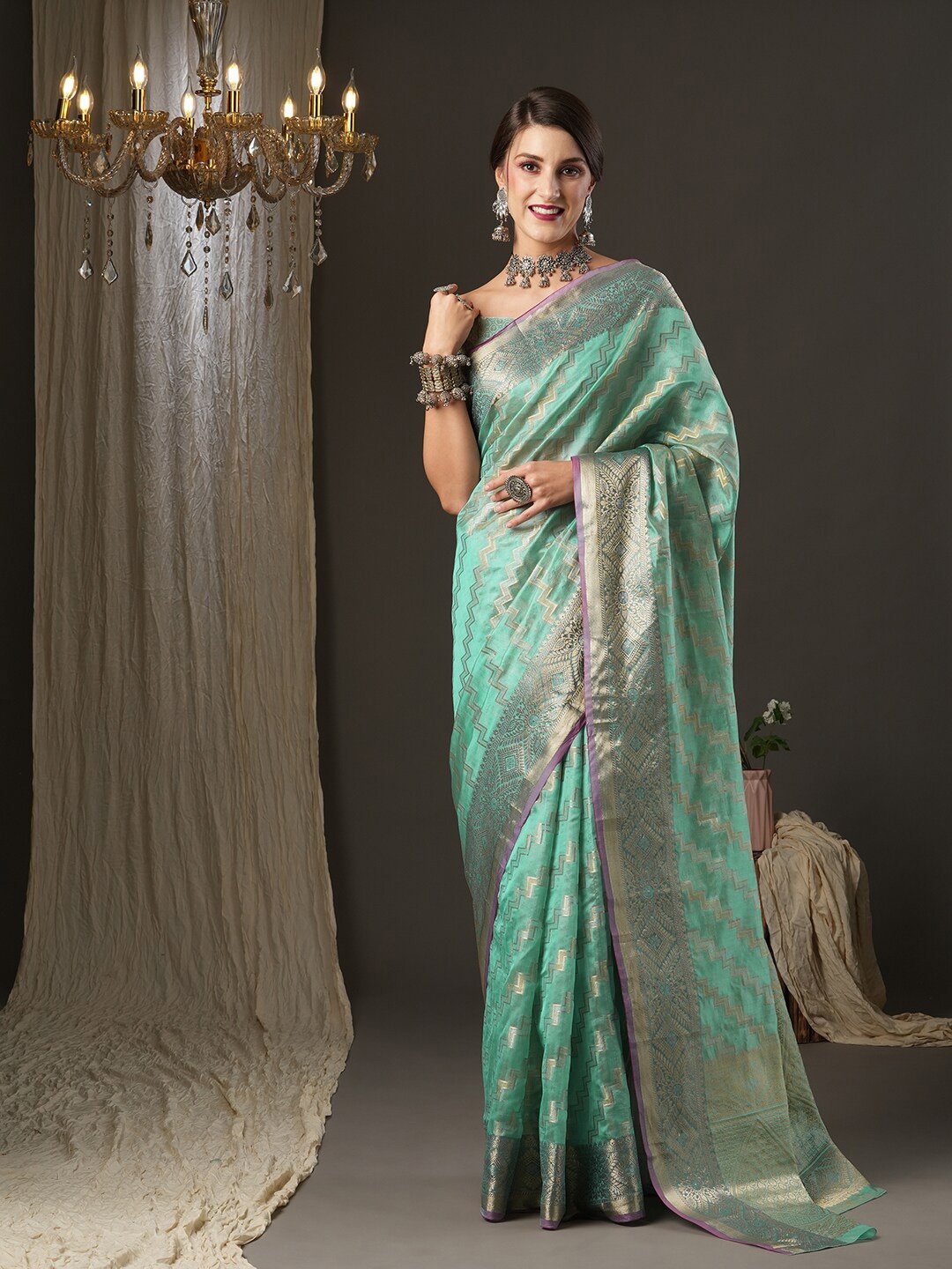 

Saree mall Sea Green & Silver-Toned Ethnic Motifs Zari Banarasi Saree