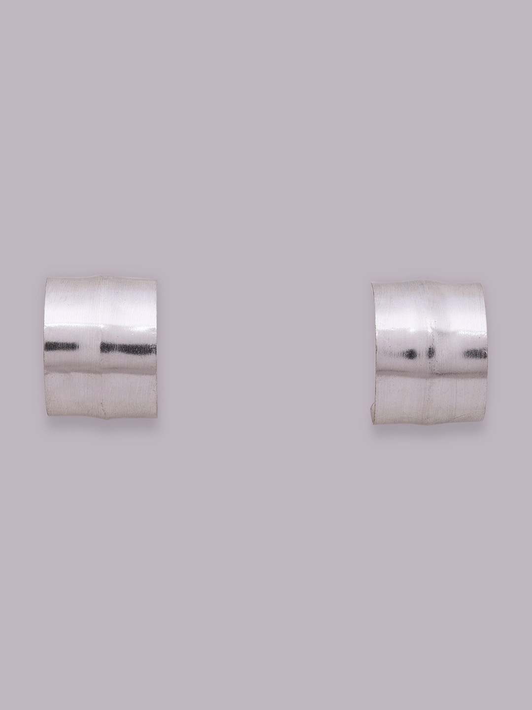 

Ikram Silver-Toned Contemporary Studs Earrings