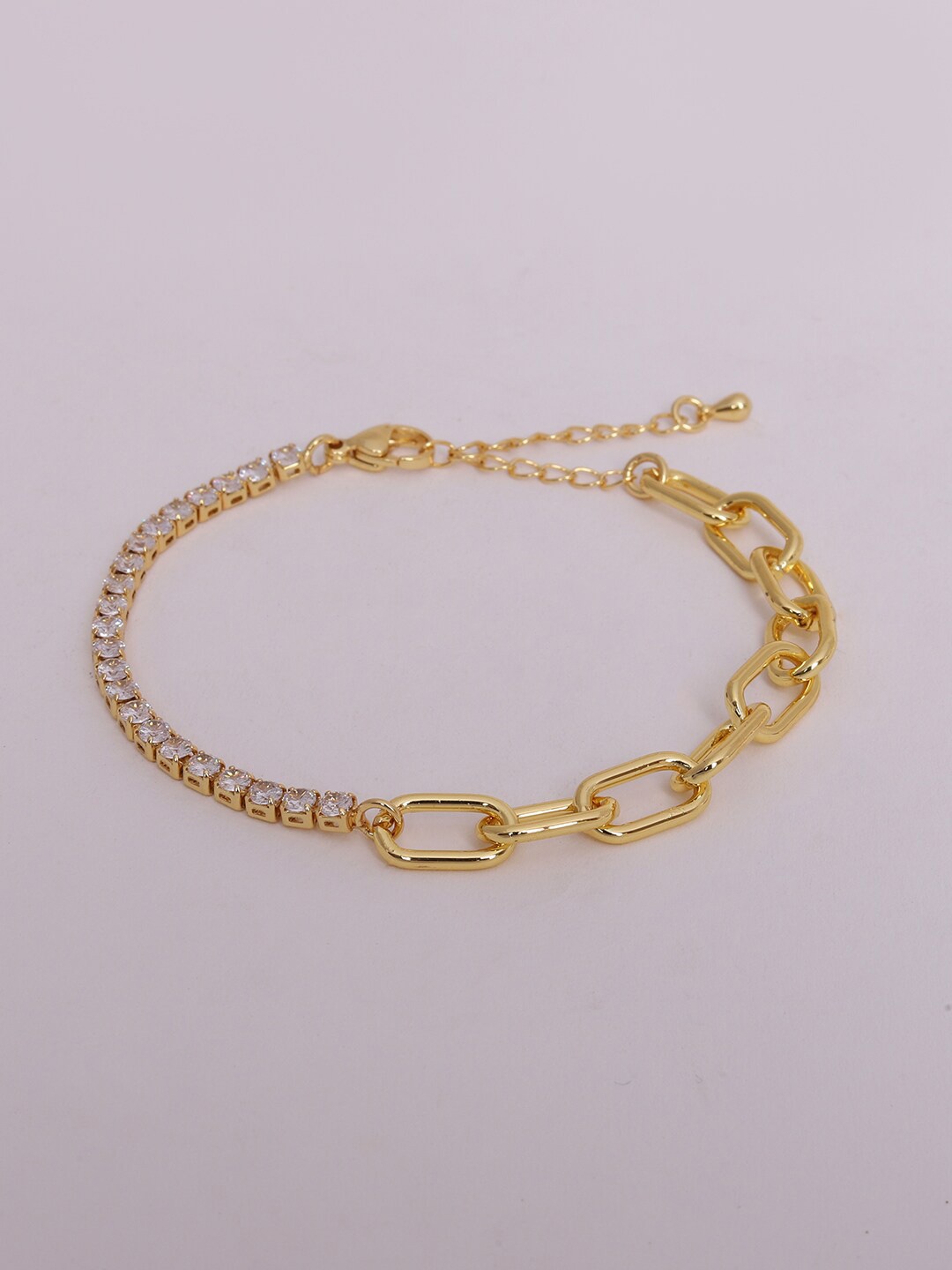 

Ikram Women Gold-Toned & White Brass Cubic Zirconia Gold-Plated Link Bracelet