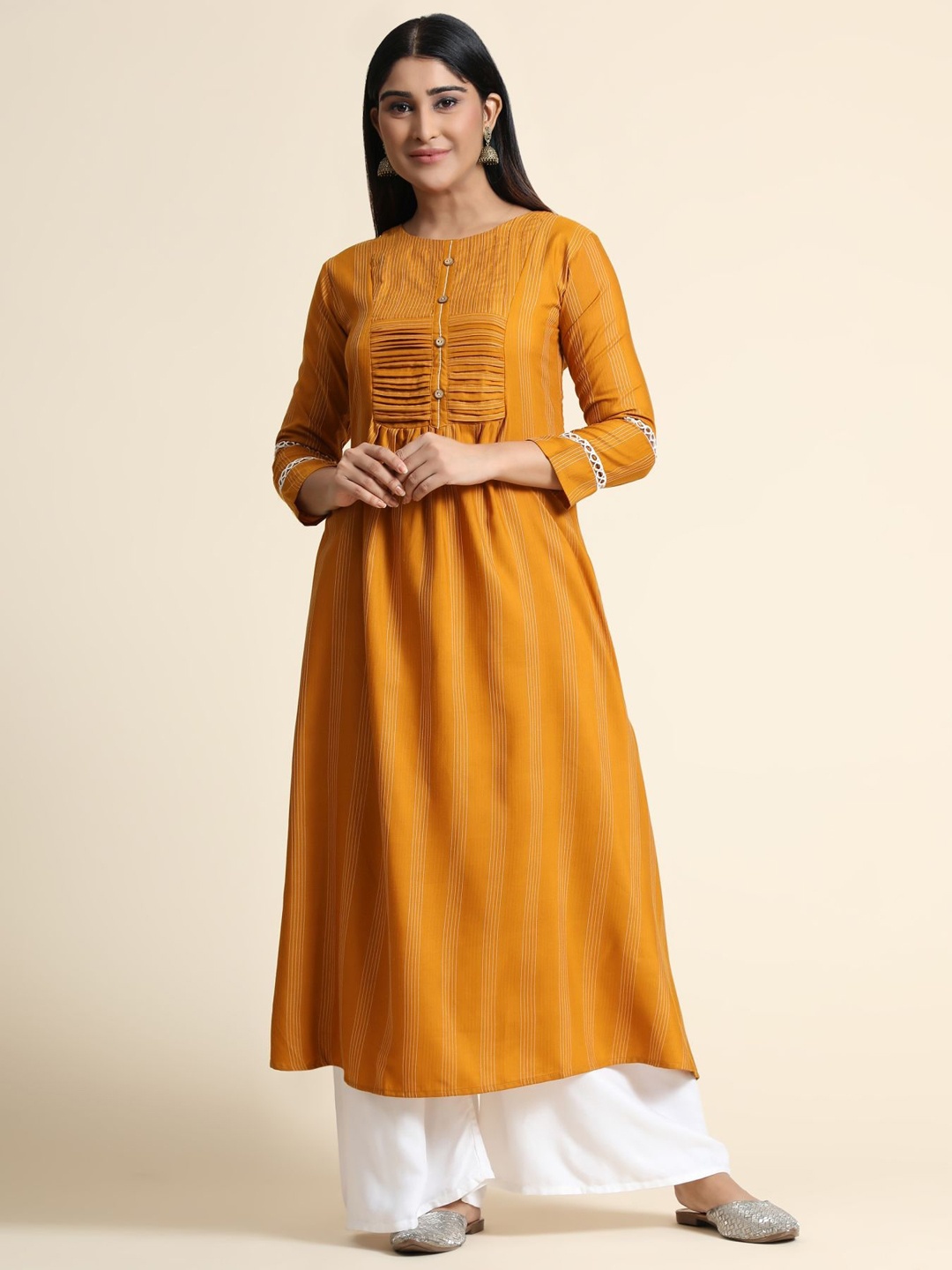 

KALINI Printed Thread Work Linen Kurta with Palazzos, Mustard