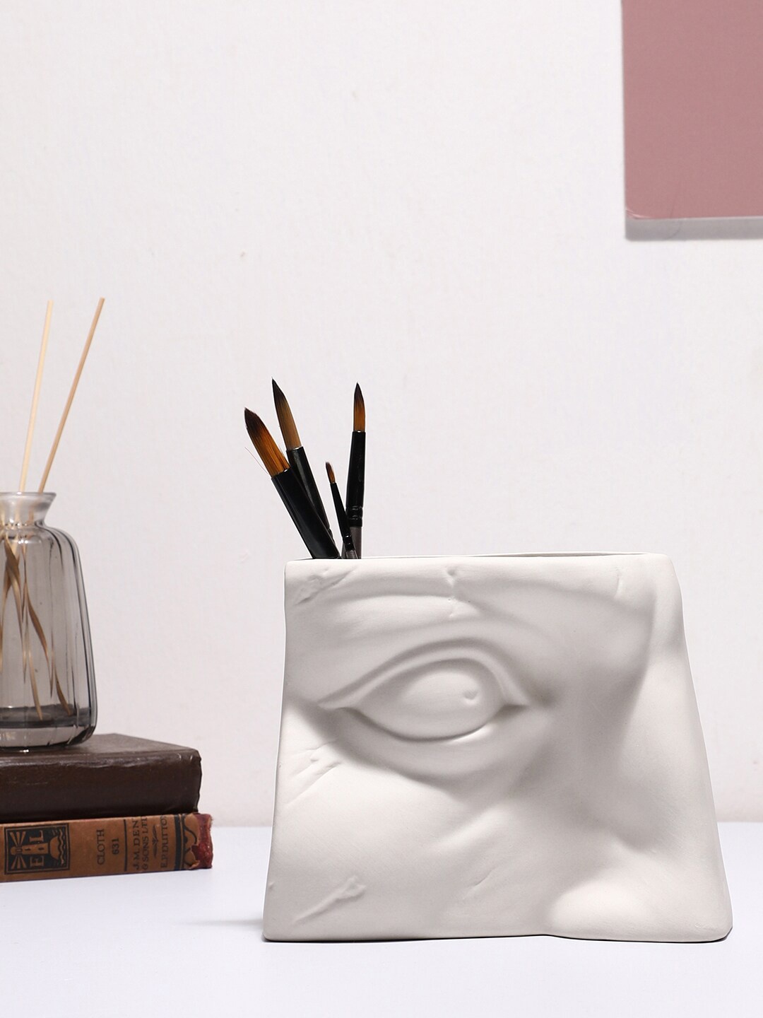 

Bonhomie White Textured Eye Shaped Minimalistic Ceramic Vase
