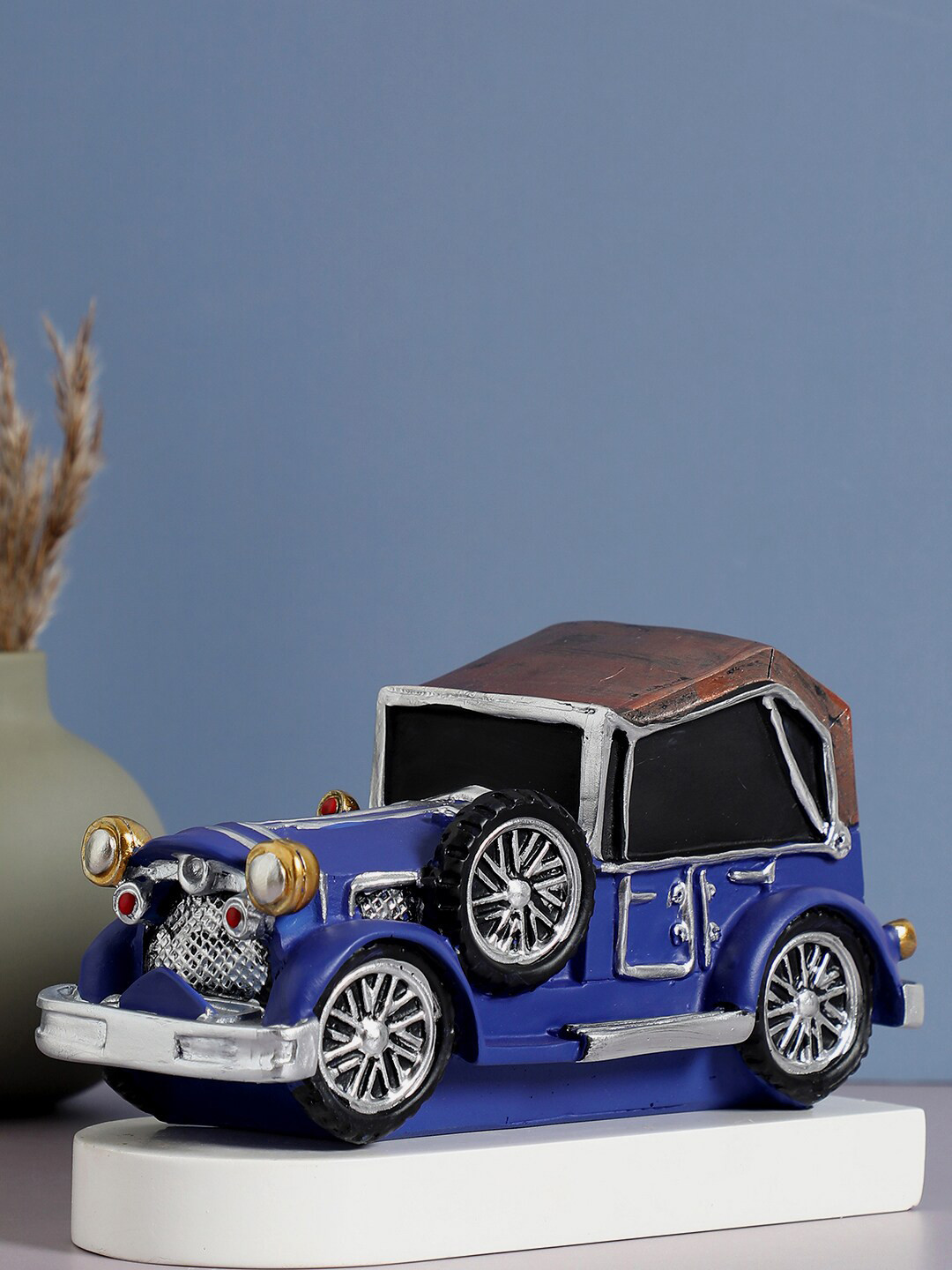 

Bonhomie Blue & Silver-Toned Textured Vintage Car Ceramic Showpieces