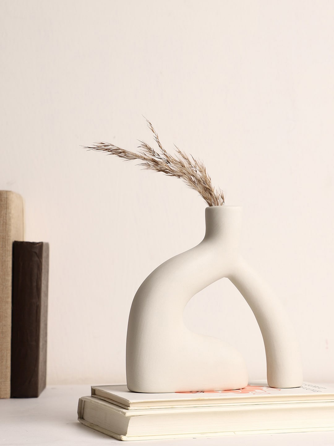 

Bonhomie White Abstract Shaped Minimalistic Ceramic Vase