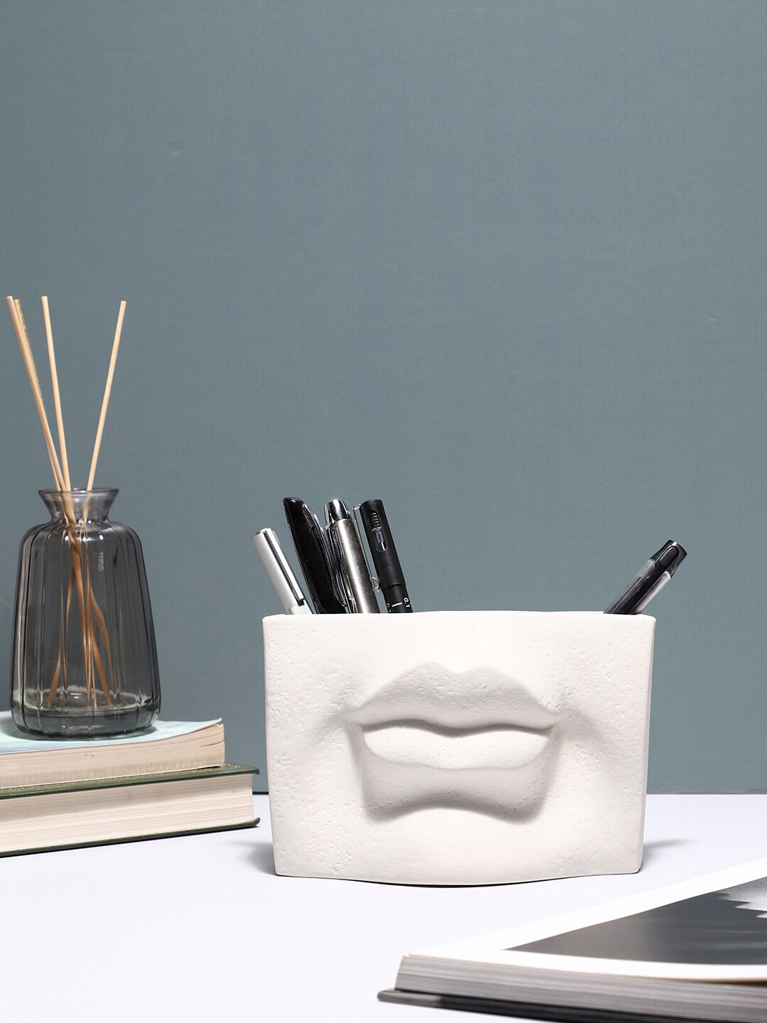 

Bonhomie White Textured Lip Shaped Minimalistic Ceramic Vase