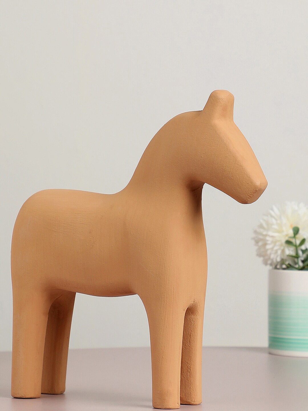

Bonhomie Beige Horse Ceramic Sculpture Showpieces