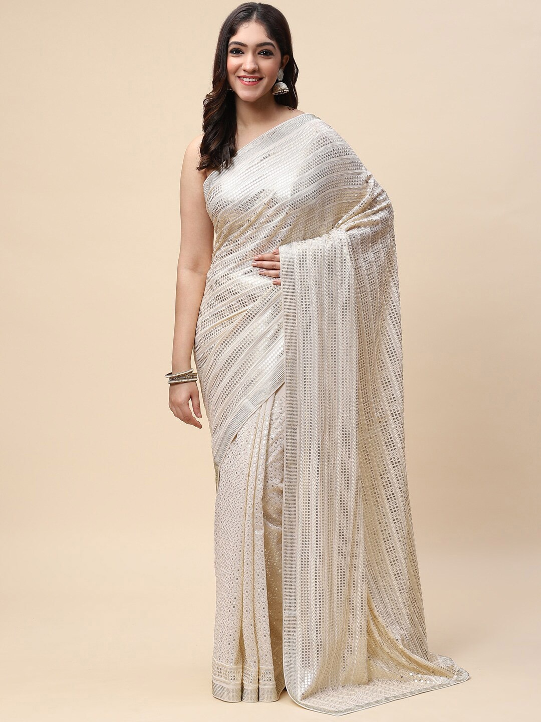 

Meena Bazaar Beige & Silver-Toned Embellished Sequinned Saree
