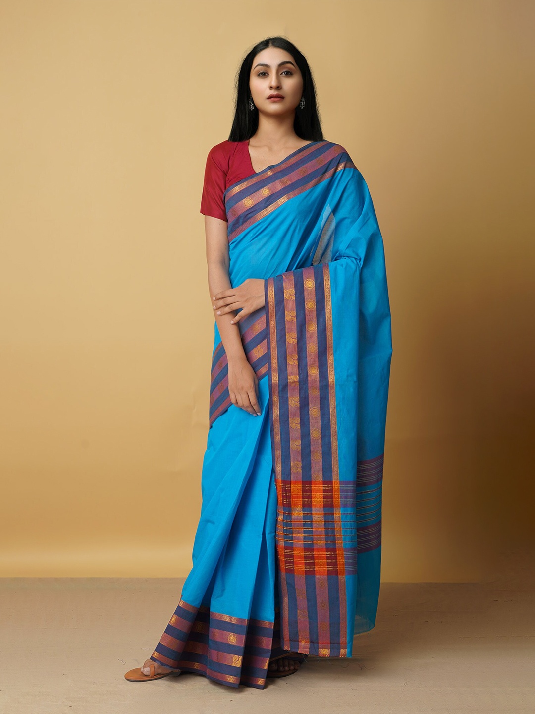 

Unnati Silks Blue & Orange Zari Pure Cotton Venkatgiri Saree